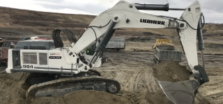 Liebherr 984 Excavator Loading Trucks with Two Passes
