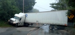 Driver Fails at Low Bridge U-Turn - USA Truck