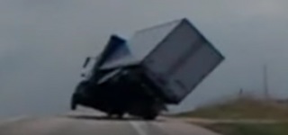 Truck Almost Flipped By Storm Winds!