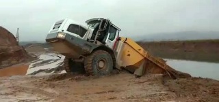 Incredible Rescue Footage: Liebherr Dumper Stuck in the Mud So Badly-Must See!!!