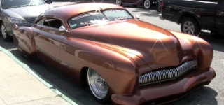 Glamorously Bronze Chopped and Lowered Mercury with Cadillac Fins on the Back