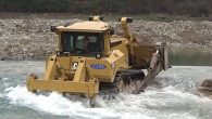 Caterpillar D8T Bulldozer Working Hard in the River