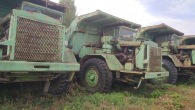 The Largest Single Fleet of Intact Old Cat &amp; Euclid Rock Trucks From the 70s Parked by the Roadside